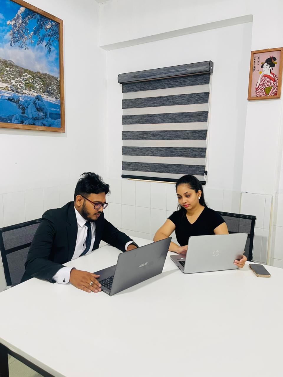 Team working together on laptops